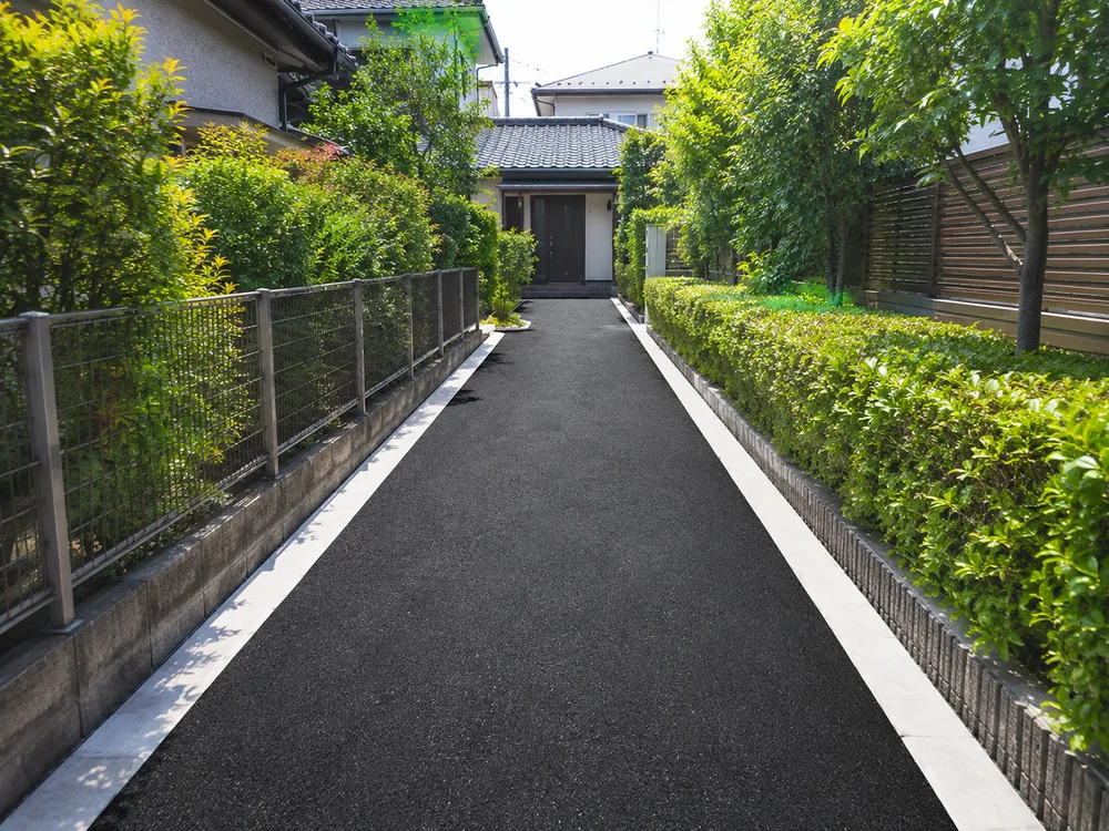 Asphalt paving for a home's private approach
