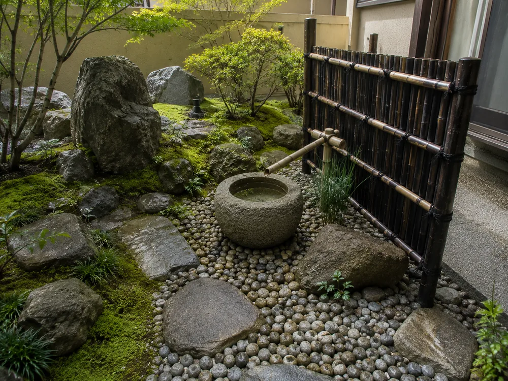 Japanese garden with set stones, a lantern and stepping stones