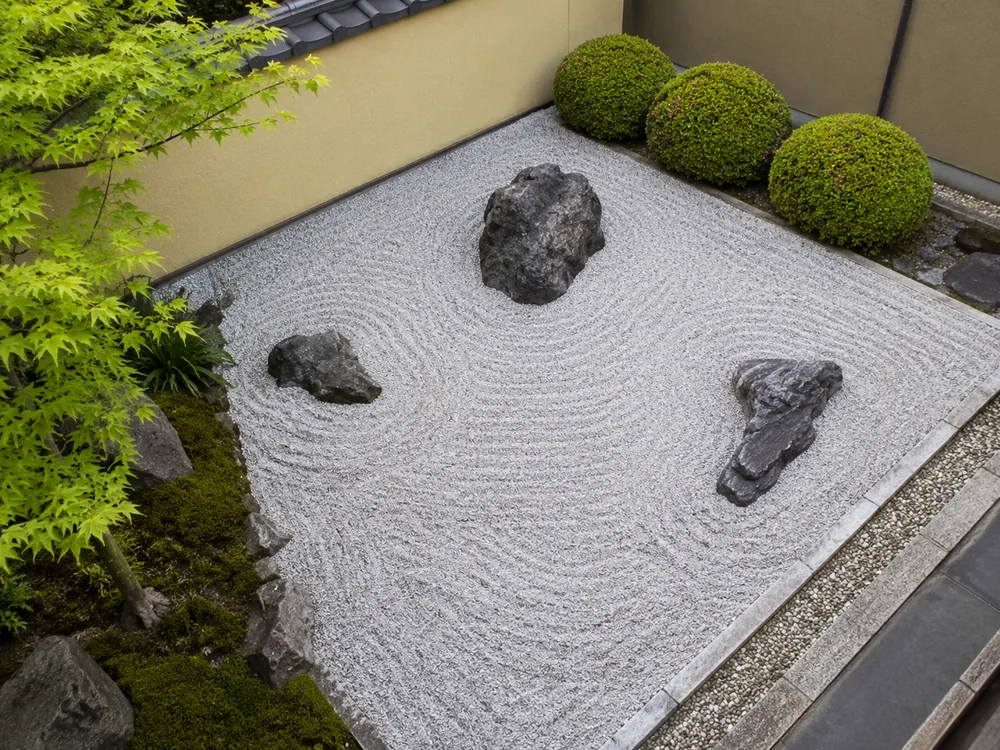Karesansui dry garden with raked white sand